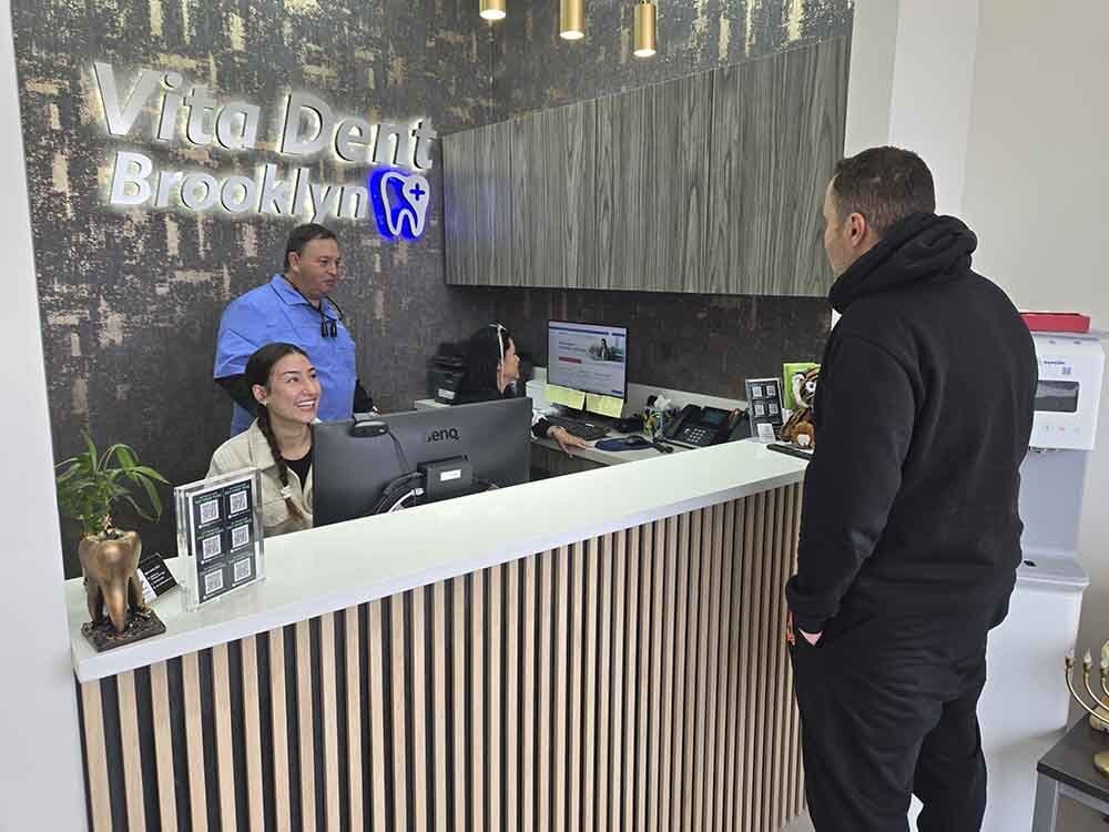 Front desk and patient check-in area at VITAdent Brooklyn