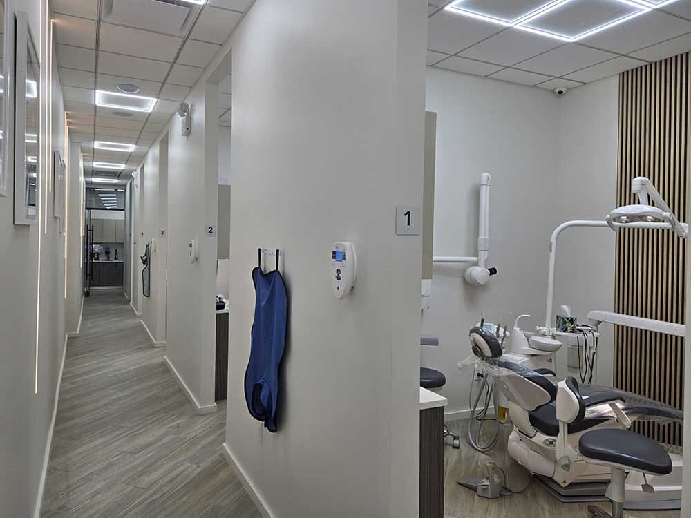 Hallway and dental treatment rooms at VITAdent Brooklyn