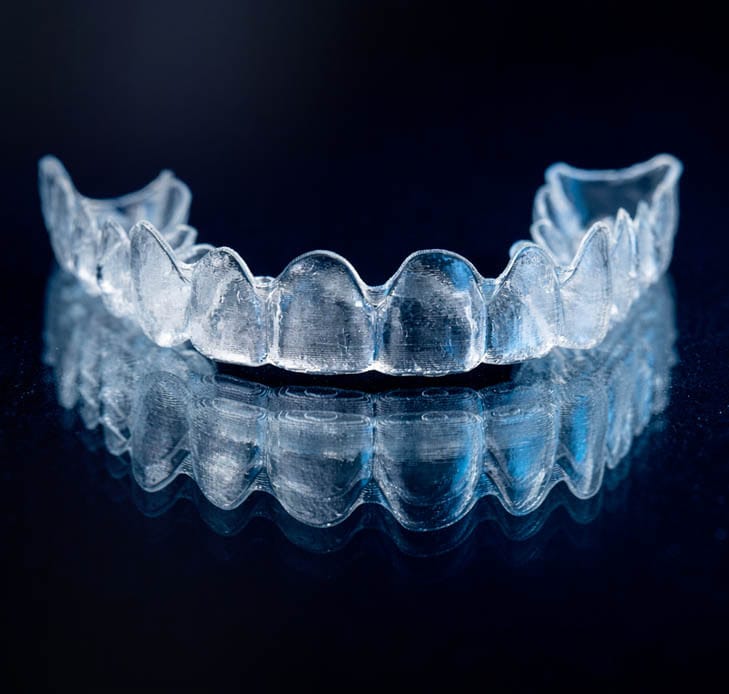 Clear Invisalign aligners used for orthodontic treatment in Sheepshead Bay, Brooklyn