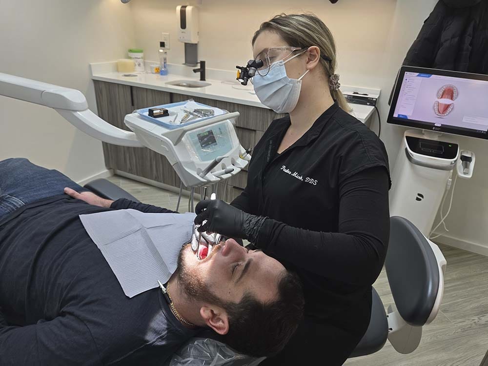 Orthodontic consultation and evaluation at VitaDent Brooklyn Dental Group in Sheepshead Bay.