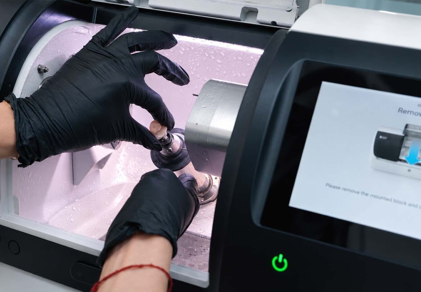 Ceramic crown being milled in the CEREC Primemill at VITAdent